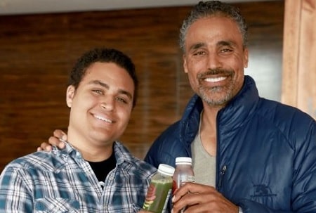 A picture of Kyle Fox with his father, Rick Fox.